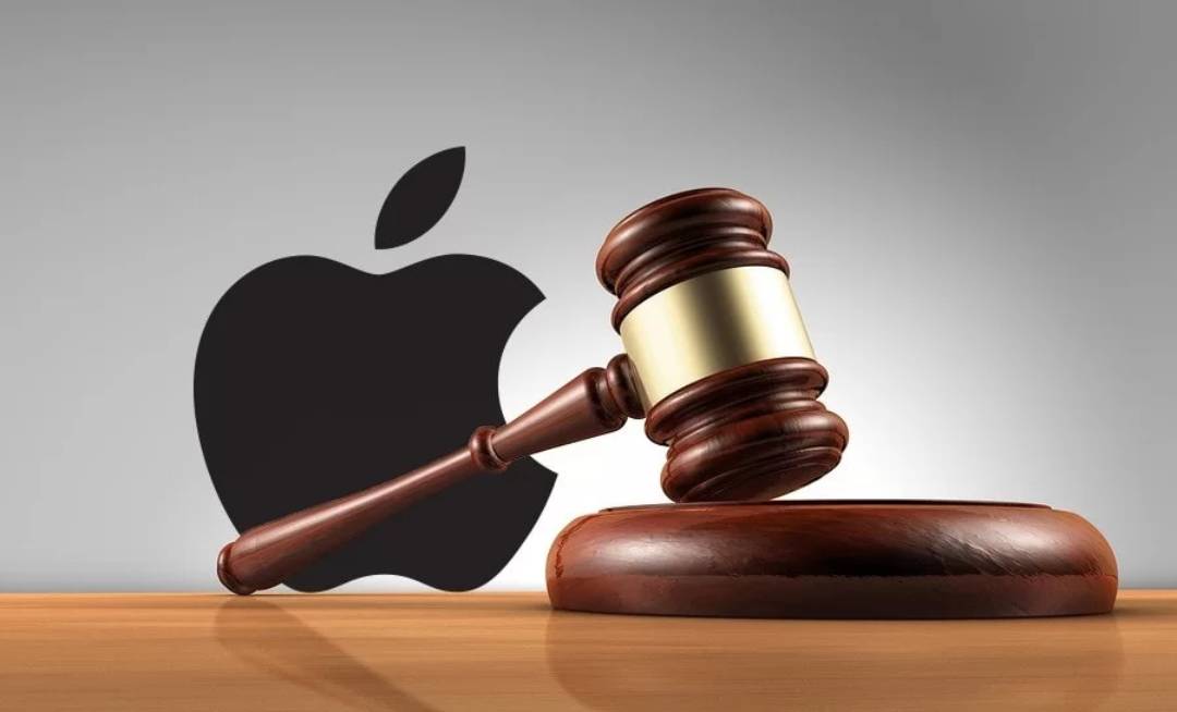 TechDogs-"An Image Of Apple's Logo Behind A Gavel"